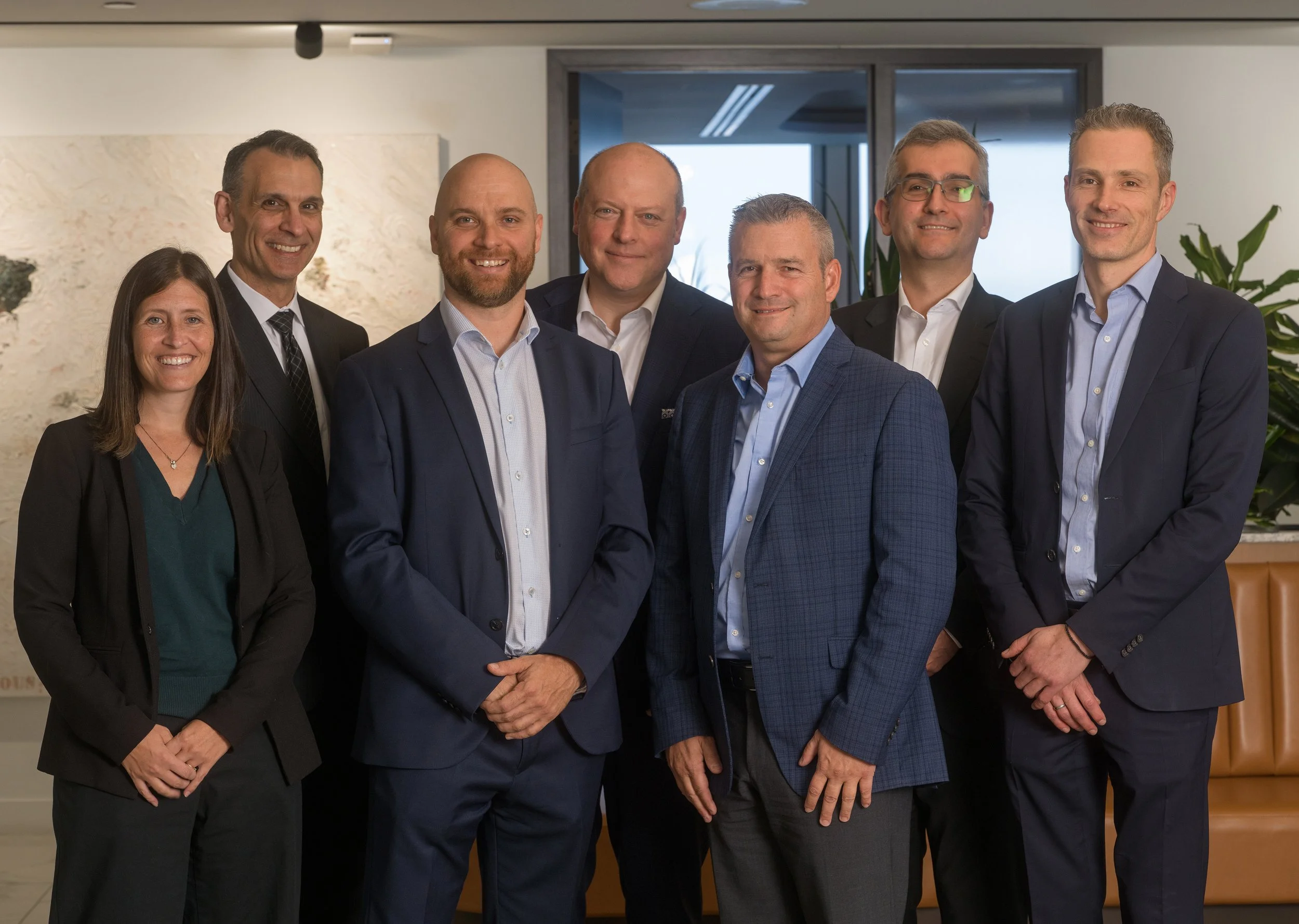 Portrait de groupe de la direction et du conseil d'administration de GEOMEGA